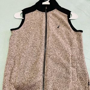 Beautiful Nautica brand vest.Used only a couple of times. It is intact,like new.